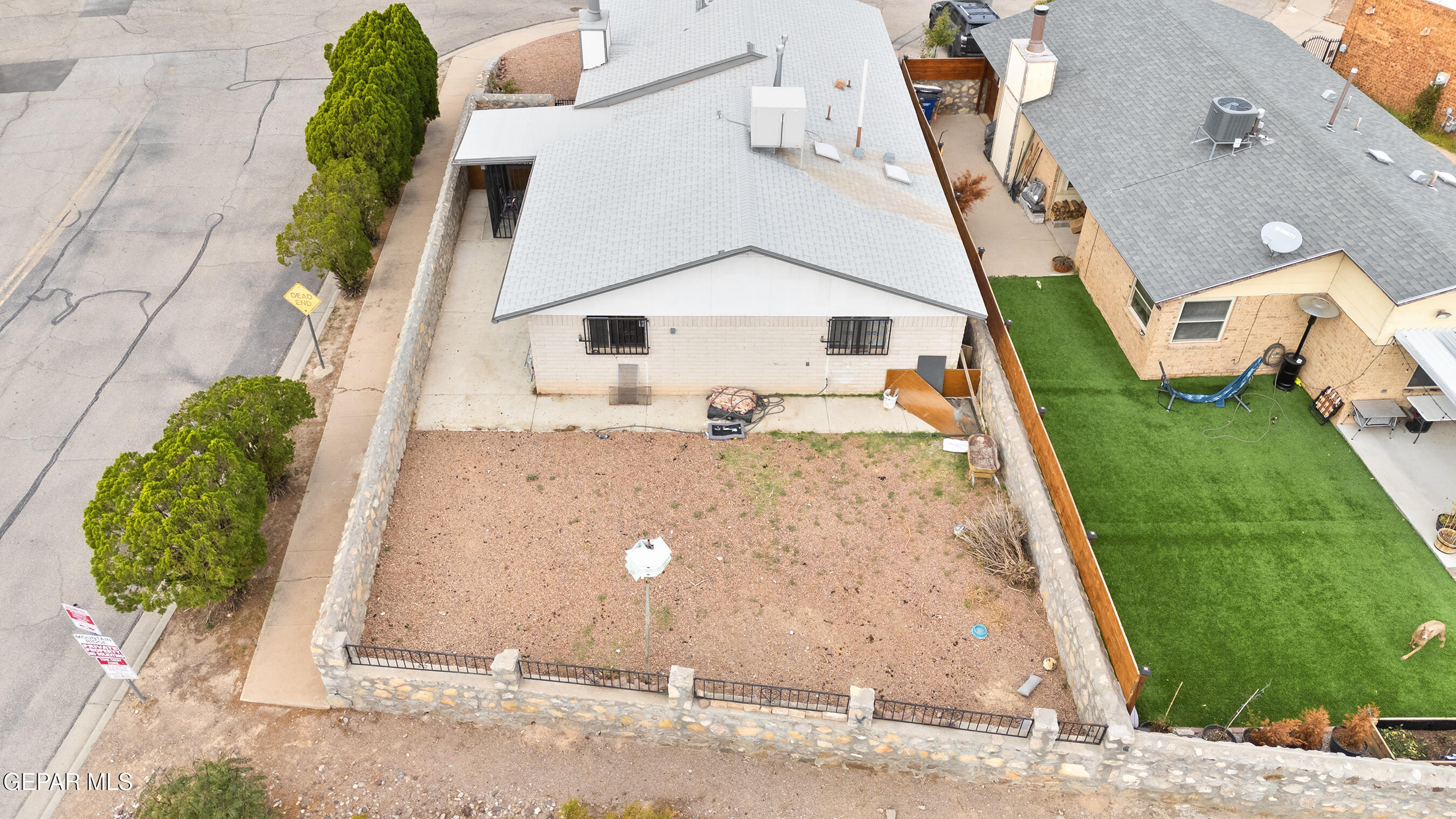 6900 Ridge Top Drive El Paso, TX 79904 - Photo 27 of 32 an aerial view of a house with a yard