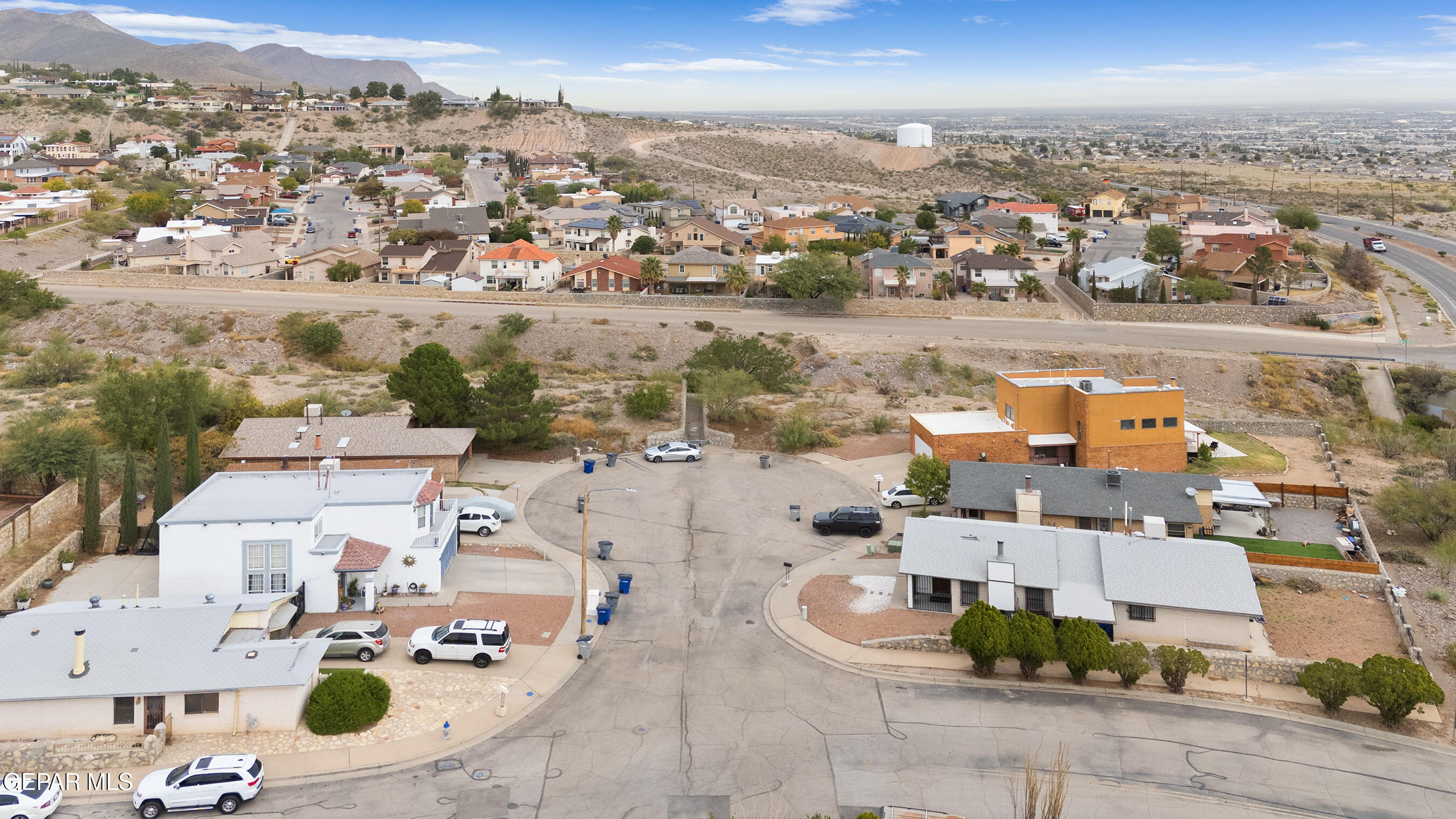 6900 Ridge Top Drive El Paso, TX 79904 - Photo 31 of 32 an aerial view of residential houses with outdoor space