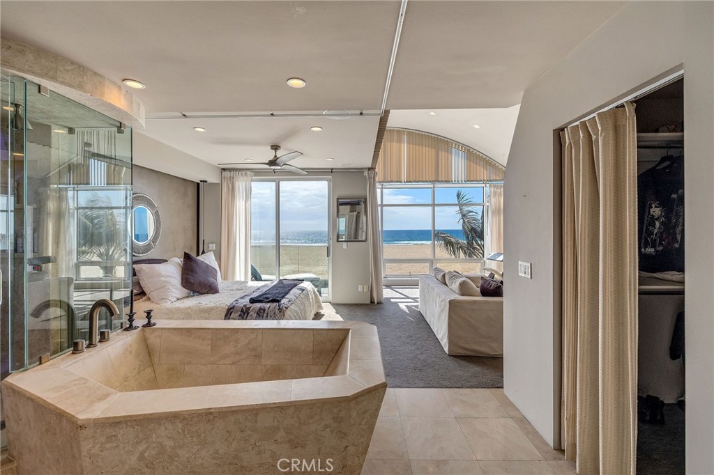 2024 The Strand Hermosa Beach, CA 90254 - Photo 24 of 65 a living room with furniture and a table