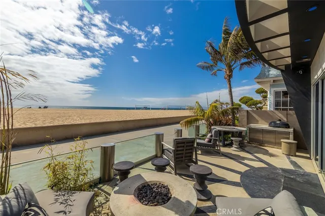 a vase of flowers sitting on a floor