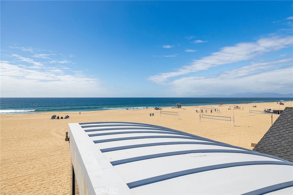 2024 The Strand Hermosa Beach, CA 90254 - Photo 45 of 65 a view of a swimming pool and an outdoor seating