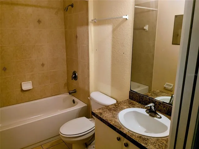 view of a bathroom with a glass door shower