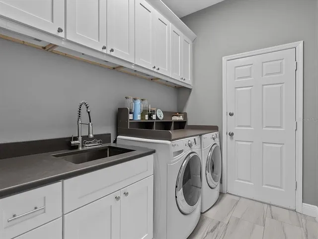 a bathroom with a bathtub a shower and a toilet