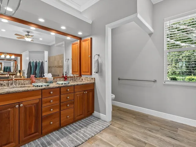 a view of a patio with a table and chairs