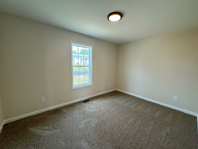 80 Modena Place Decherd, TN 37324 - Photo 13 of 14 an empty room with a window
