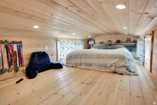 111 Barrington Way Layton, UT 84041 - Photo 9 of 10 Loft space featuring wood-finish plank flooring and ceiling