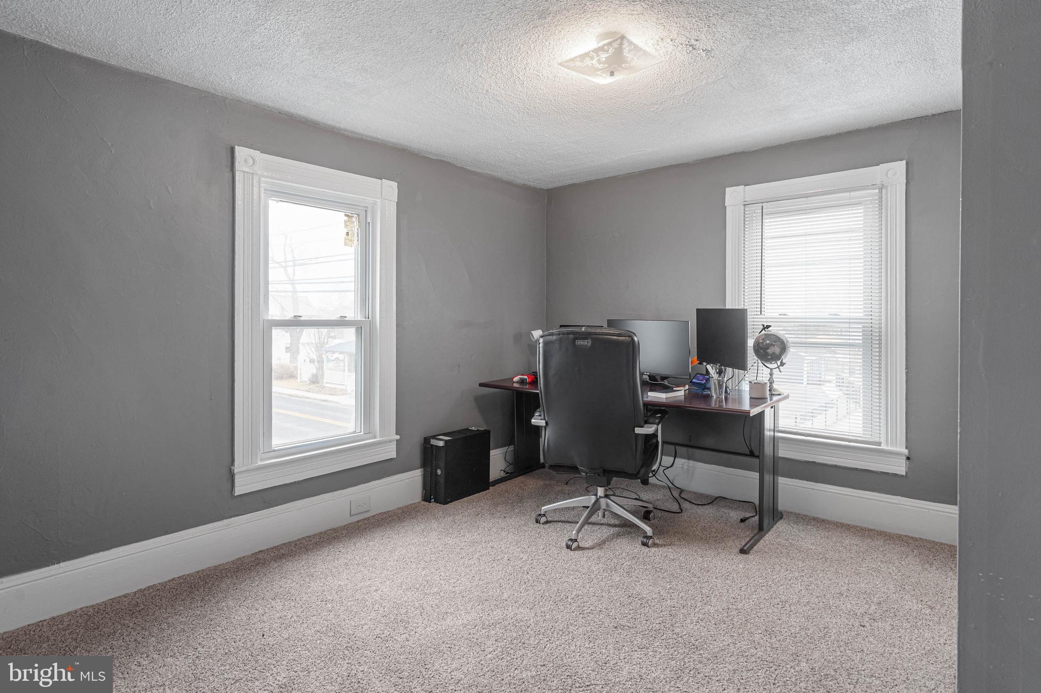 412 East State Street Delmar, MD 21875 - Photo 21 of 36 a view of a workspace with furniture and a window