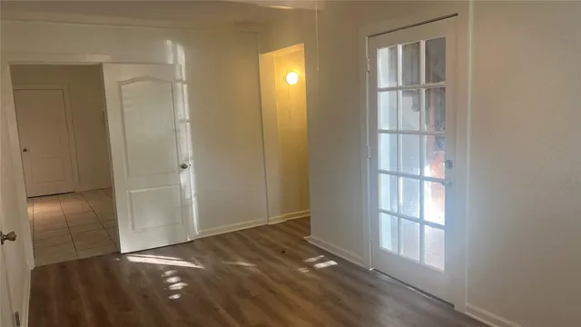 a view of small space with wooden floor