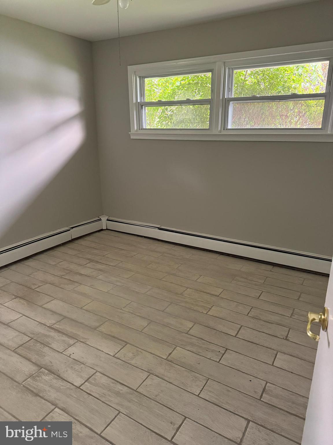 509 Winding Way Exton, PA 19341 - Photo 11 of 13 a view of an empty room with a window