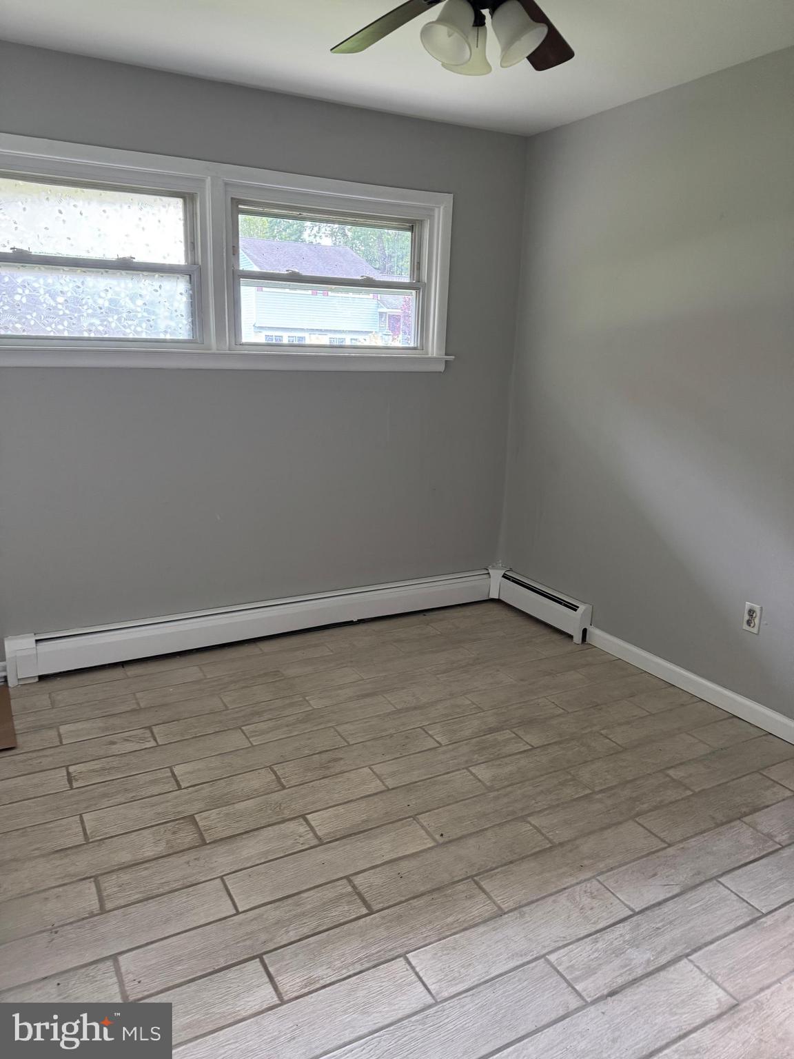 509 Winding Way Exton, PA 19341 - Photo 12 of 13 a view of a window in an empty room