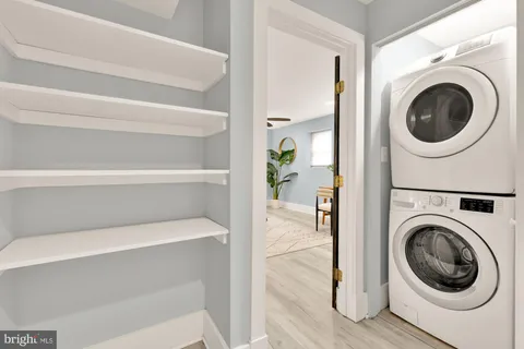 a close up view of a washer and dryer in a utility room