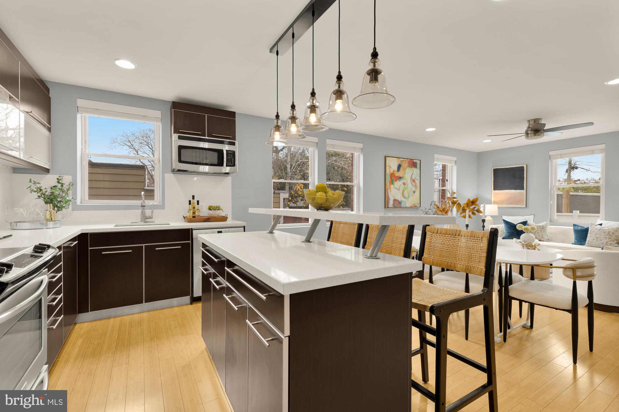1409 G Street Northeast, Unit 5 Washington, DC 20002 - Photo 9 of 29 a large kitchen with a table and chairs