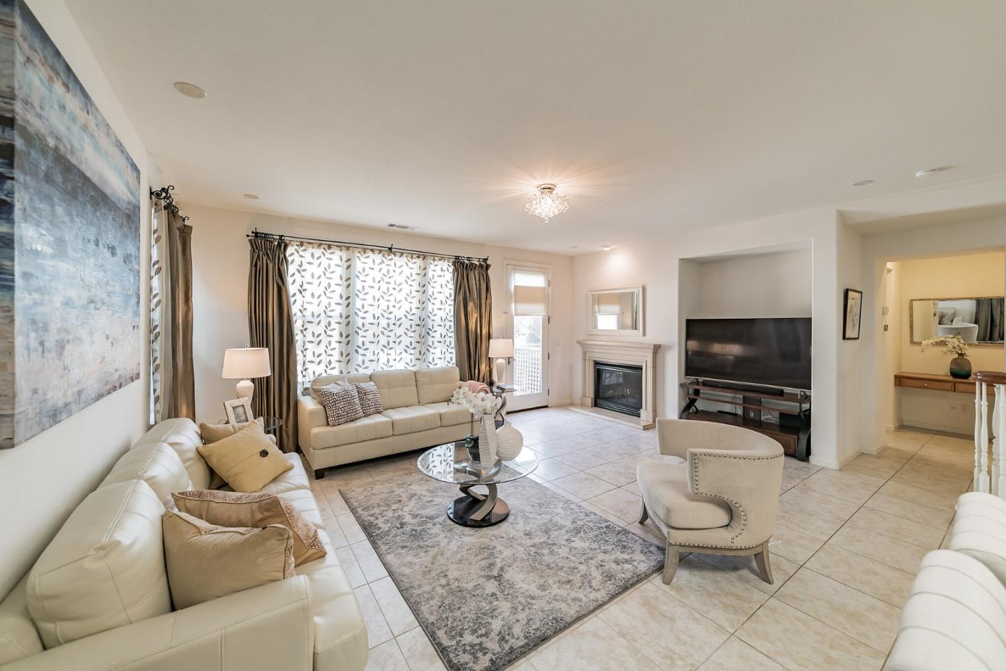 3830 Highbury Way San Ramon, CA 94582 - Photo 2 of 38 a living room with furniture and a flat screen tv