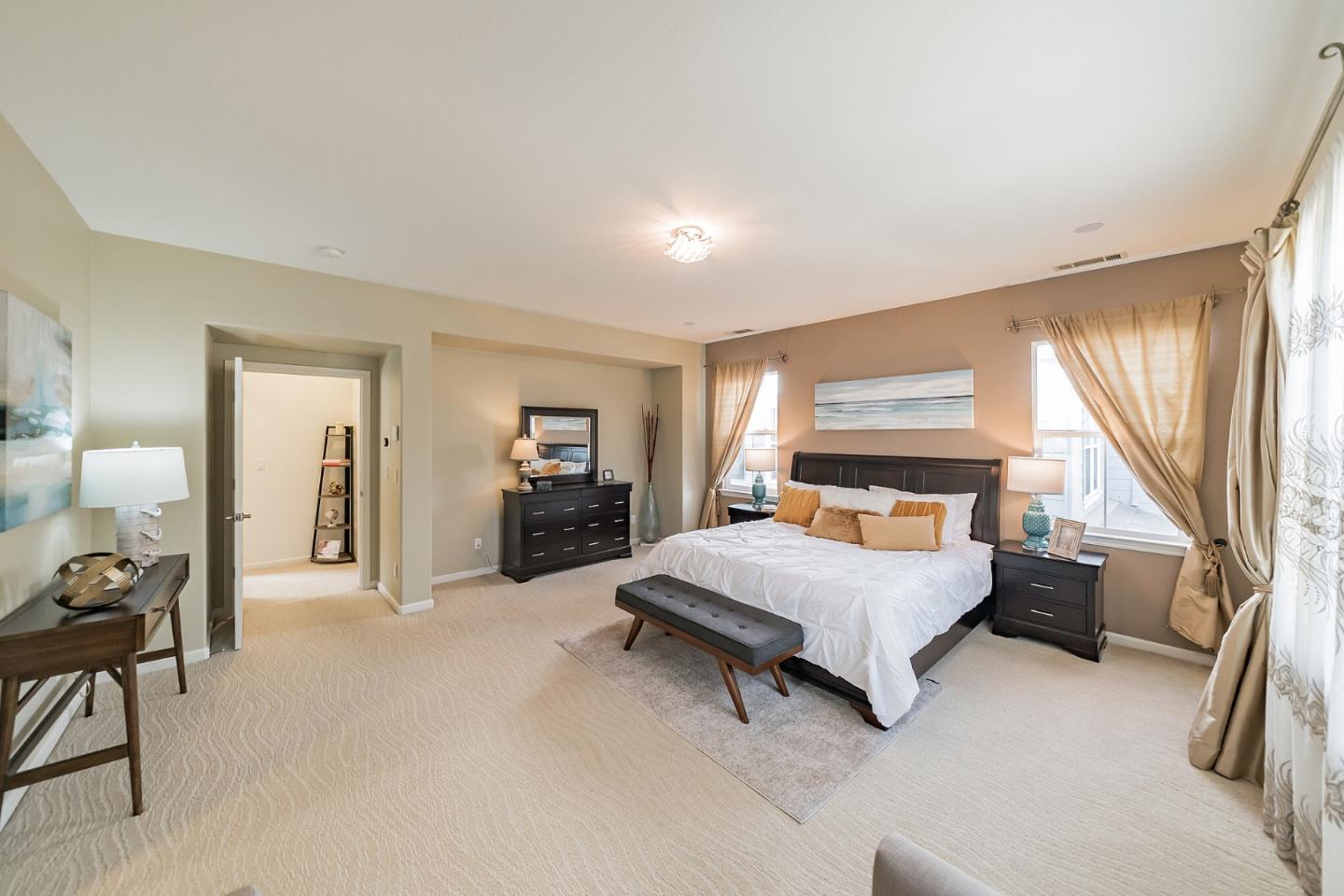 3830 Highbury Way San Ramon, CA 94582 - Photo 24 of 38 a spacious bedroom with a bed and large mirror