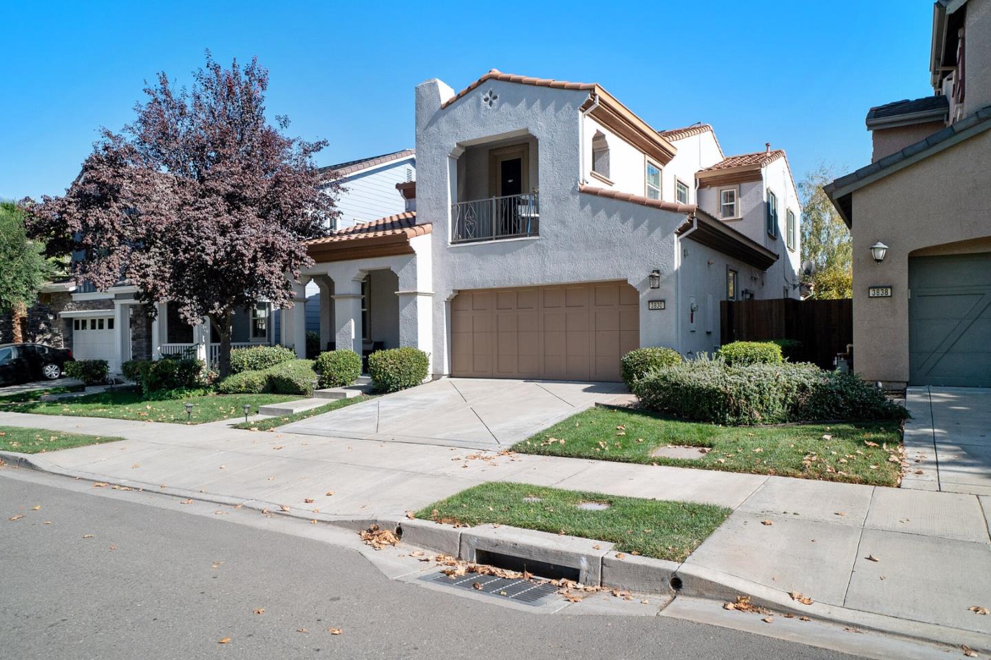 3830 Highbury Way San Ramon, CA 94582 - Photo 27 of 38 a front view of a house with a yard and a garage