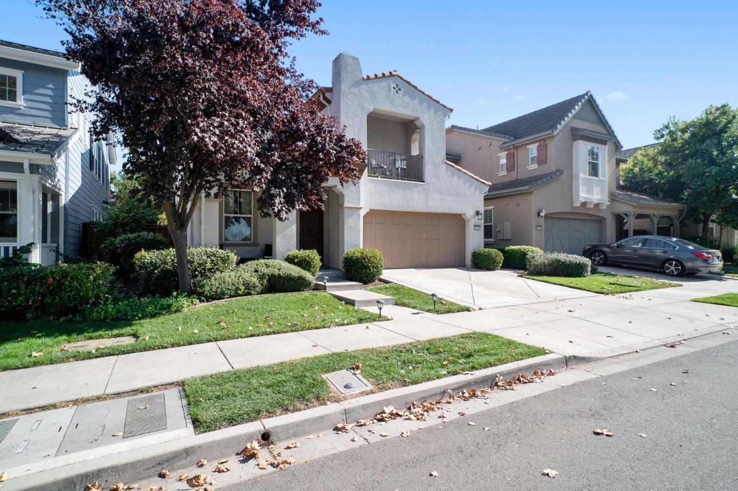 3830 Highbury Way San Ramon, CA 94582 - Photo 28 of 38 a front view of a house with a yard and a garage
