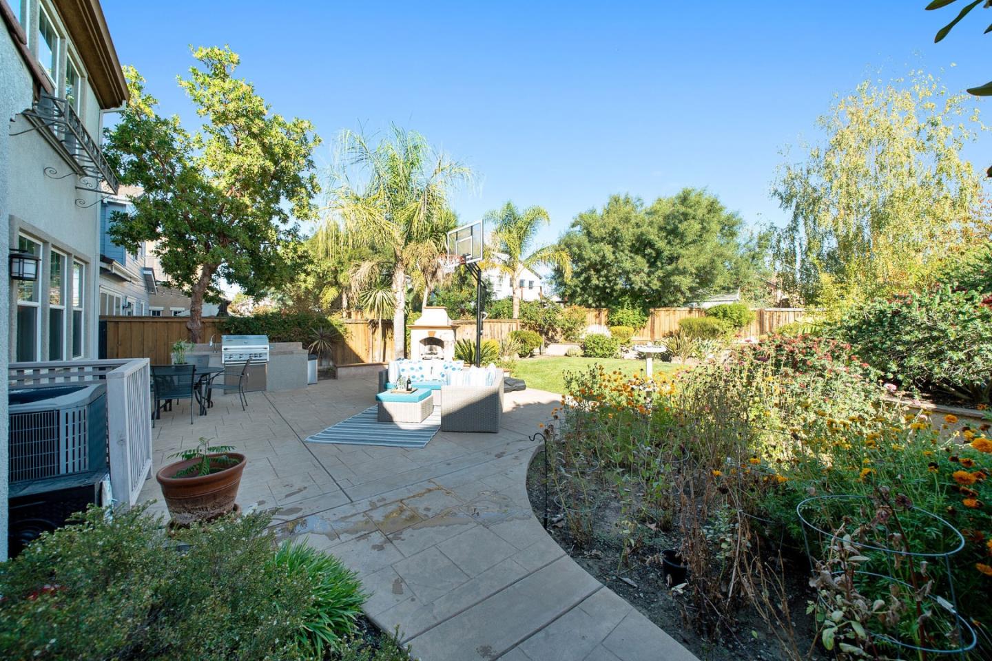 3830 Highbury Way San Ramon, CA 94582 - Photo 31 of 38 a view of a backyard with table and chairs and potted plants