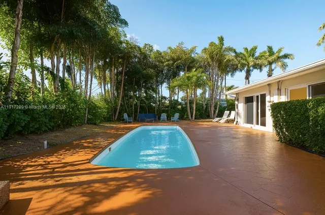 a view of outdoor space yard and swimming pool