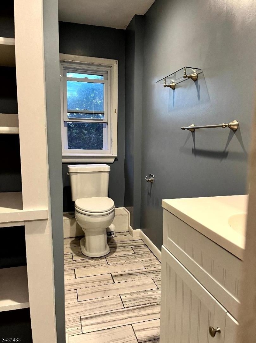 30 Fowler Street Franklin, NJ 07416 - Photo 21 of 27 a bathroom with a toilet and a sink