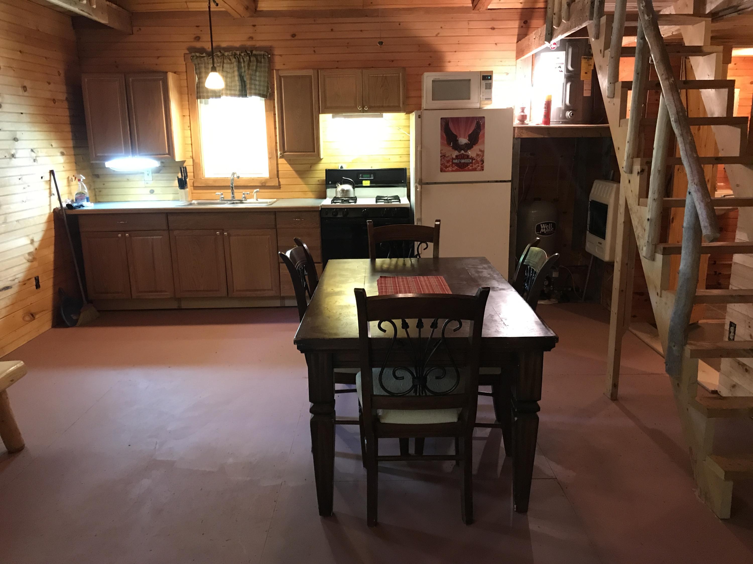 7 Tucker Ridge Road Springfield, ME 04487 - Photo 5 of 22 Kitchen and dining area