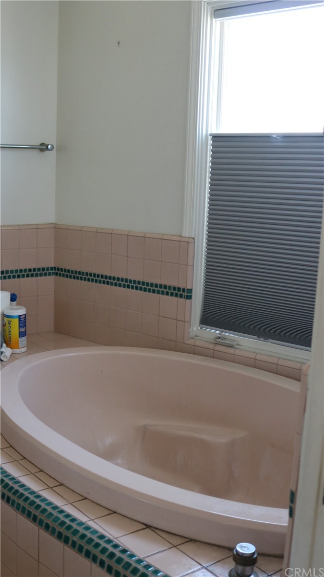 183 Lower Terrace Road Avalon, CA 90704 - Photo 26 of 33 a bathroom with bathtub and shower