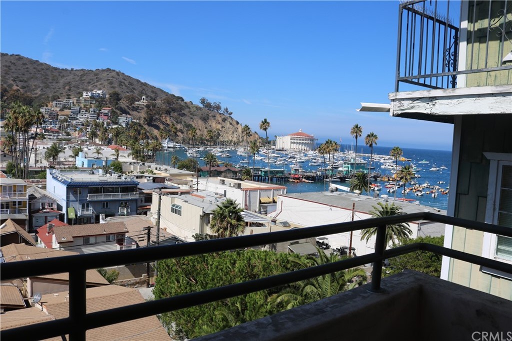 183 Lower Terrace Road Avalon, CA 90704 - Photo 30 of 33 a view of a chairs and table in the balcony