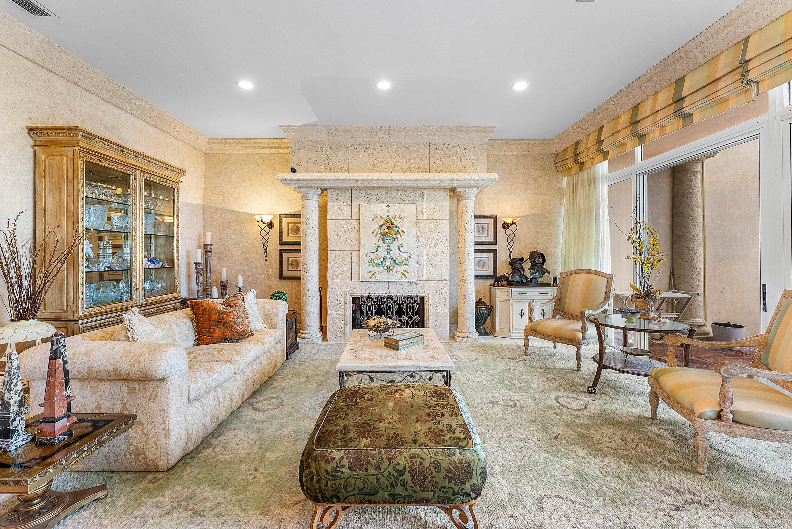 13 Sloans Curve Drive, Unit 13 Palm Beach, FL 33480 - Photo 11 of 47 a living room with furniture large window and rug
