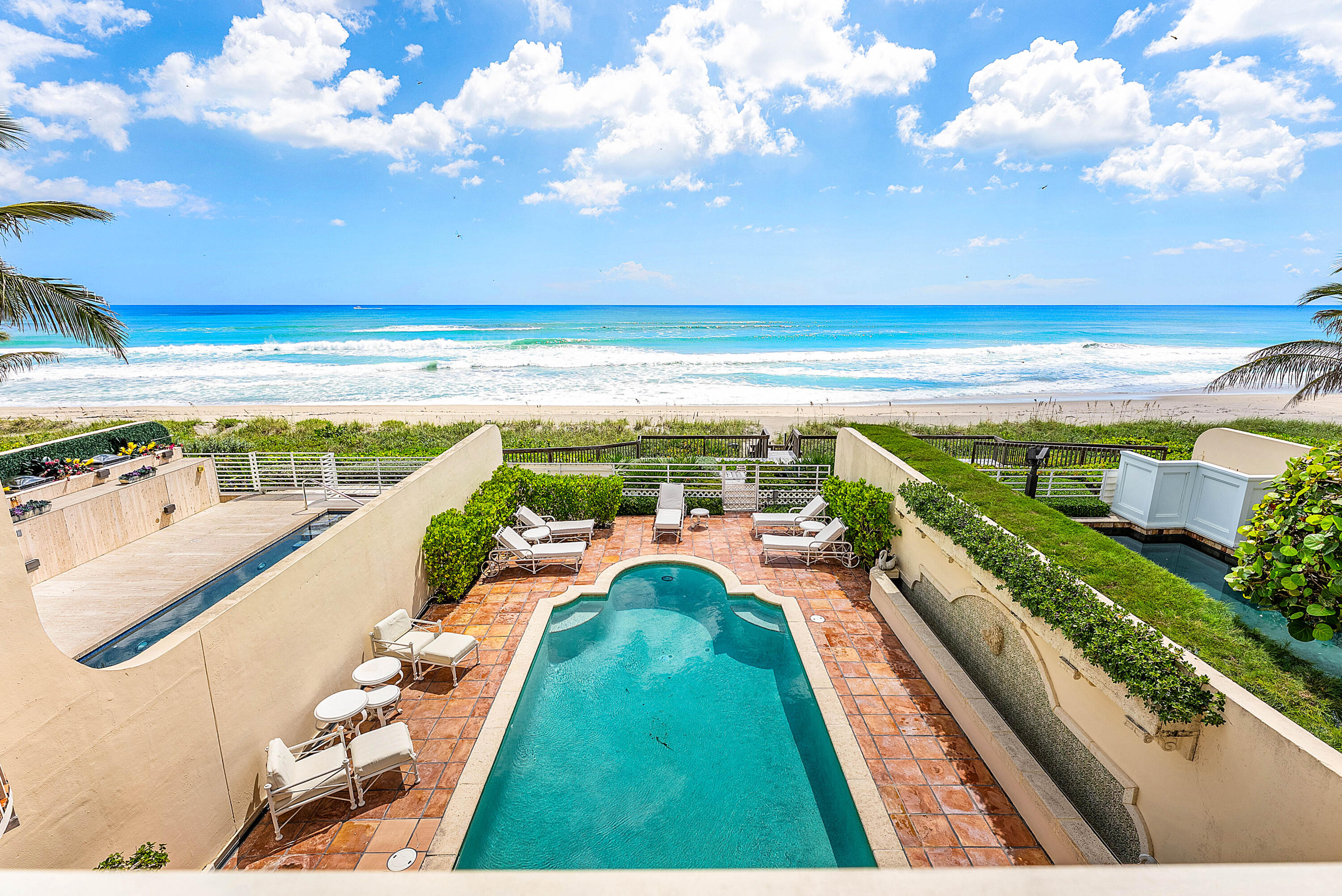 13 Sloans Curve Drive, Unit 13 Palm Beach, FL 33480 - Photo 32 of 47 a view of an ocean from a balcony