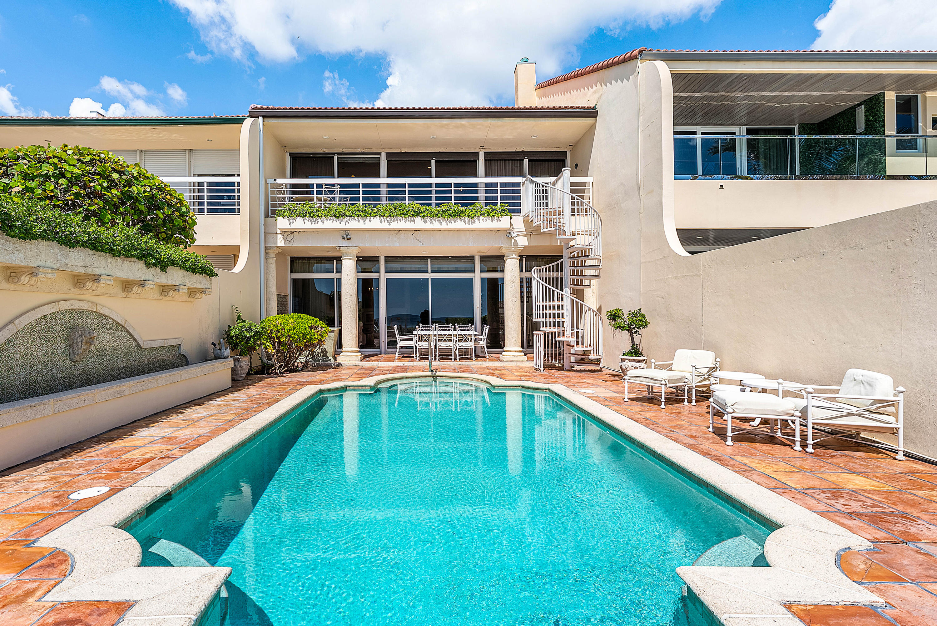 13 Sloans Curve Drive, Unit 13 Palm Beach, FL 33480 - Photo 34 of 47 a swimming pool view with a outdoor seating