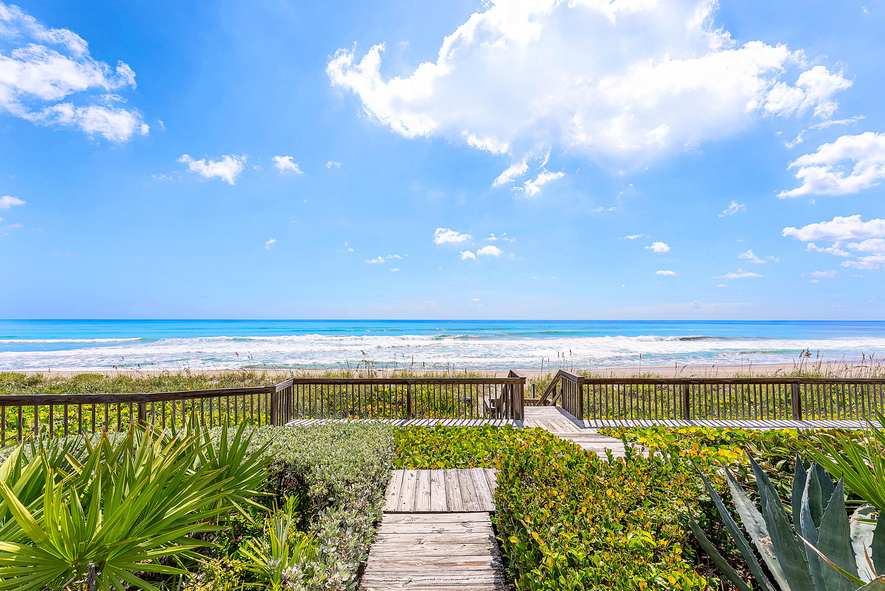 13 Sloans Curve Drive, Unit 13 Palm Beach, FL 33480 - Photo 35 of 47 a view of a swimming pool and an outdoor seating