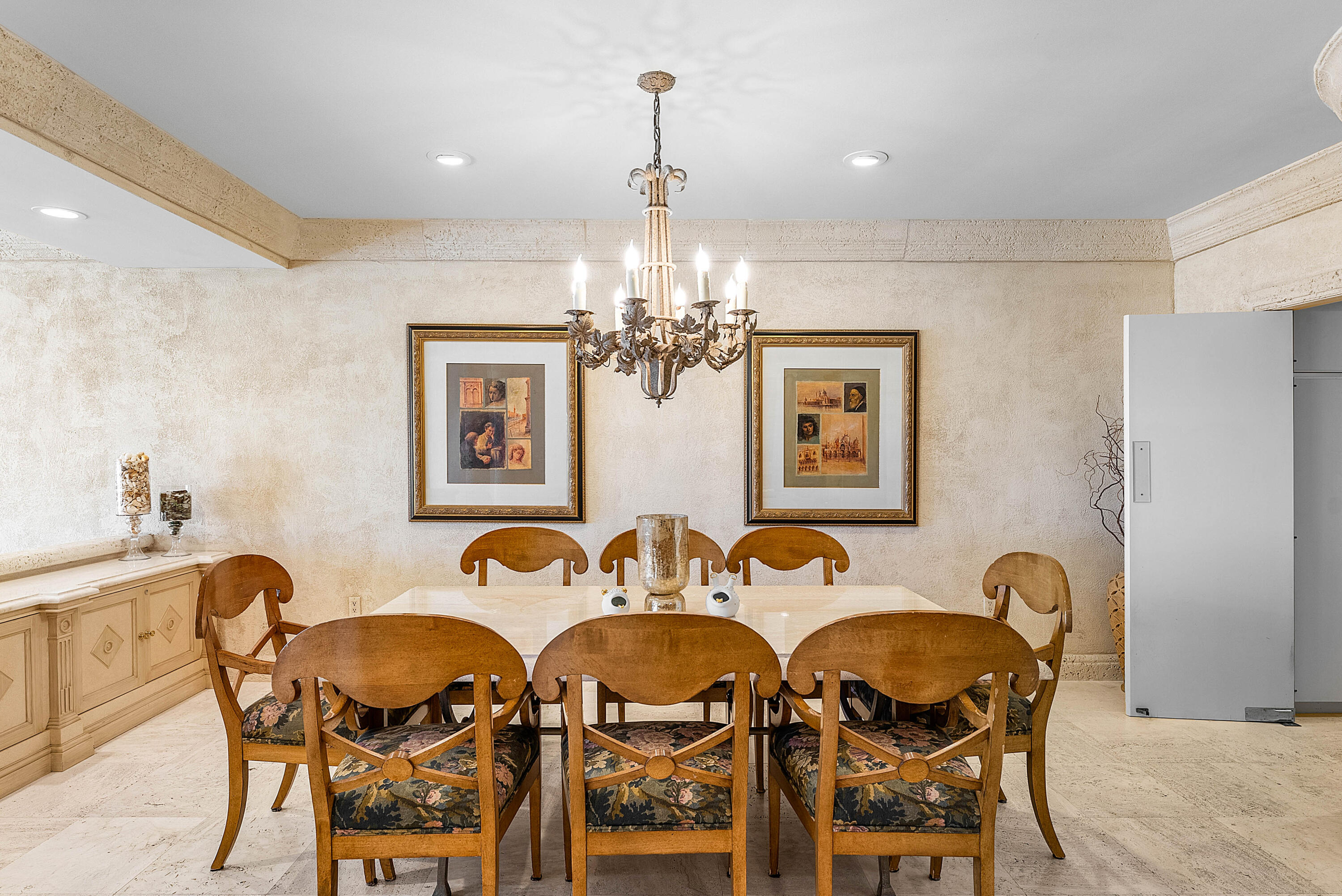 13 Sloans Curve Drive, Unit 13 Palm Beach, FL 33480 - Photo 7 of 47 a view of a dining room with furniture and chandelier