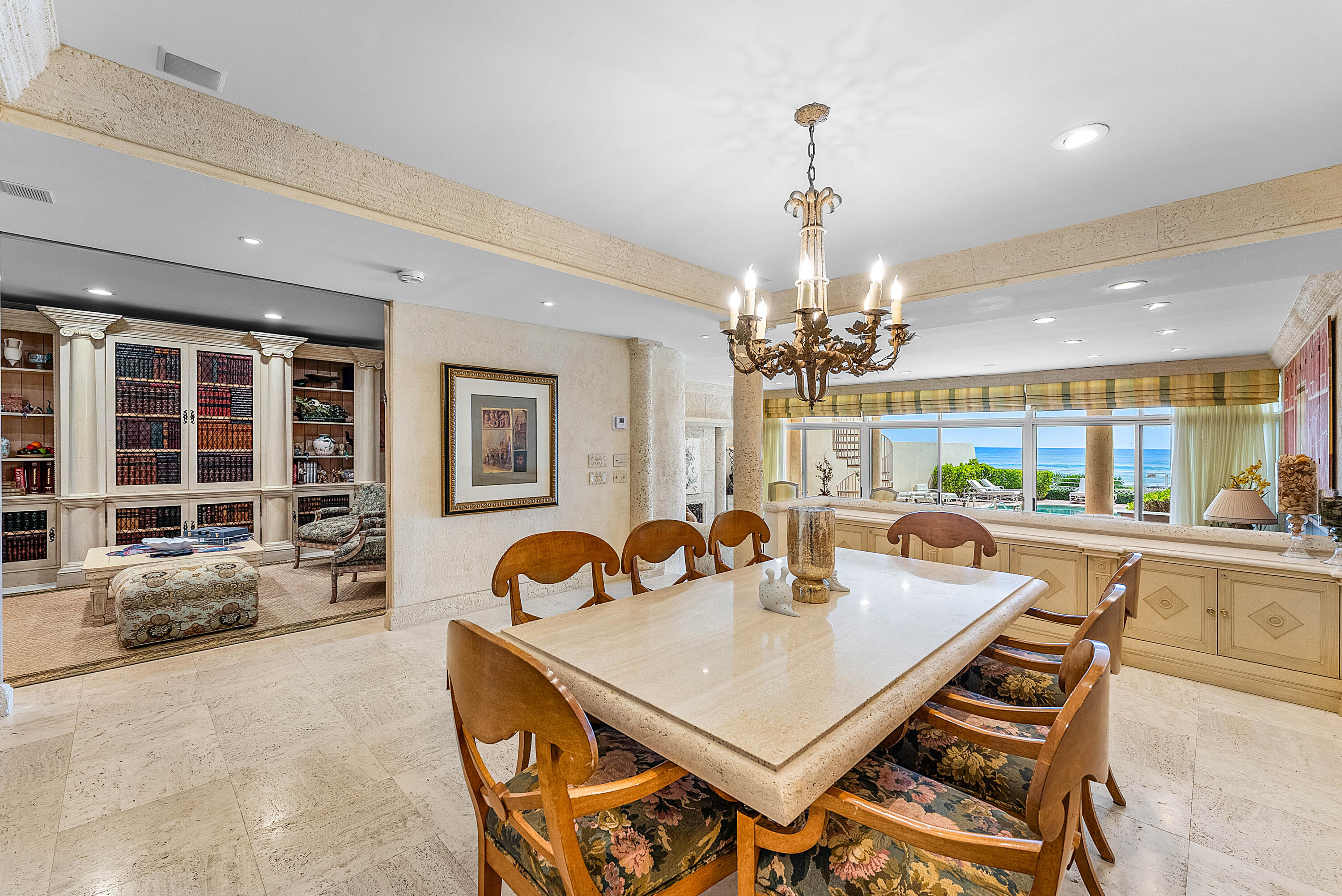 13 Sloans Curve Drive, Unit 13 Palm Beach, FL 33480 - Photo 8 of 47 a dining room with furniture a chandelier and window