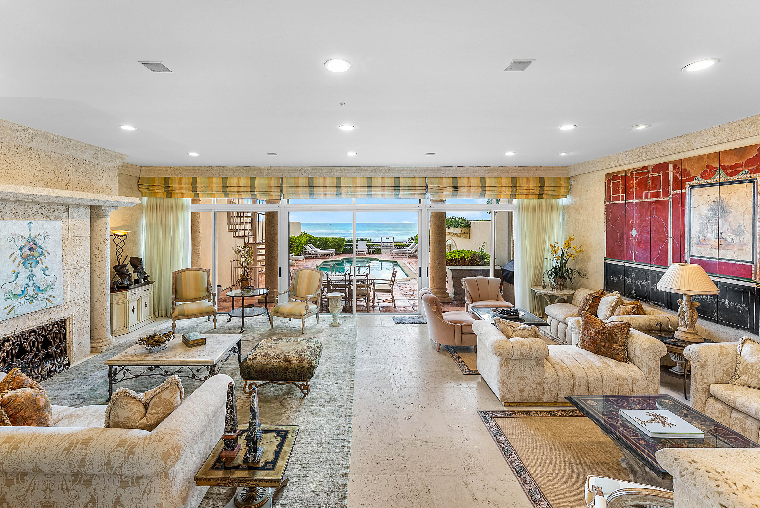13 Sloans Curve Drive, Unit 13 Palm Beach, FL 33480 - Photo 9 of 47 a living room with furniture kitchen view and large windows