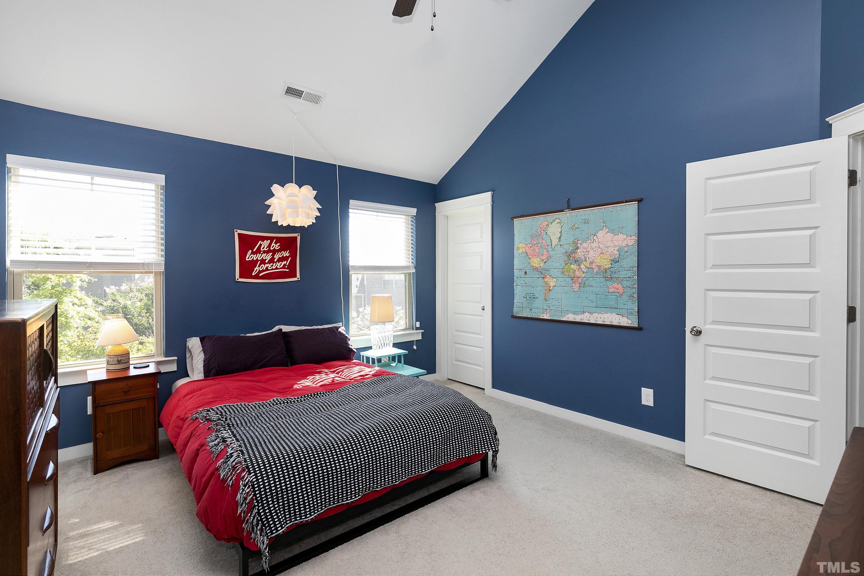 7906 Allscott Way Raleigh, NC 27612 - Photo 17 of 30 a bedroom with a bed and a dresser