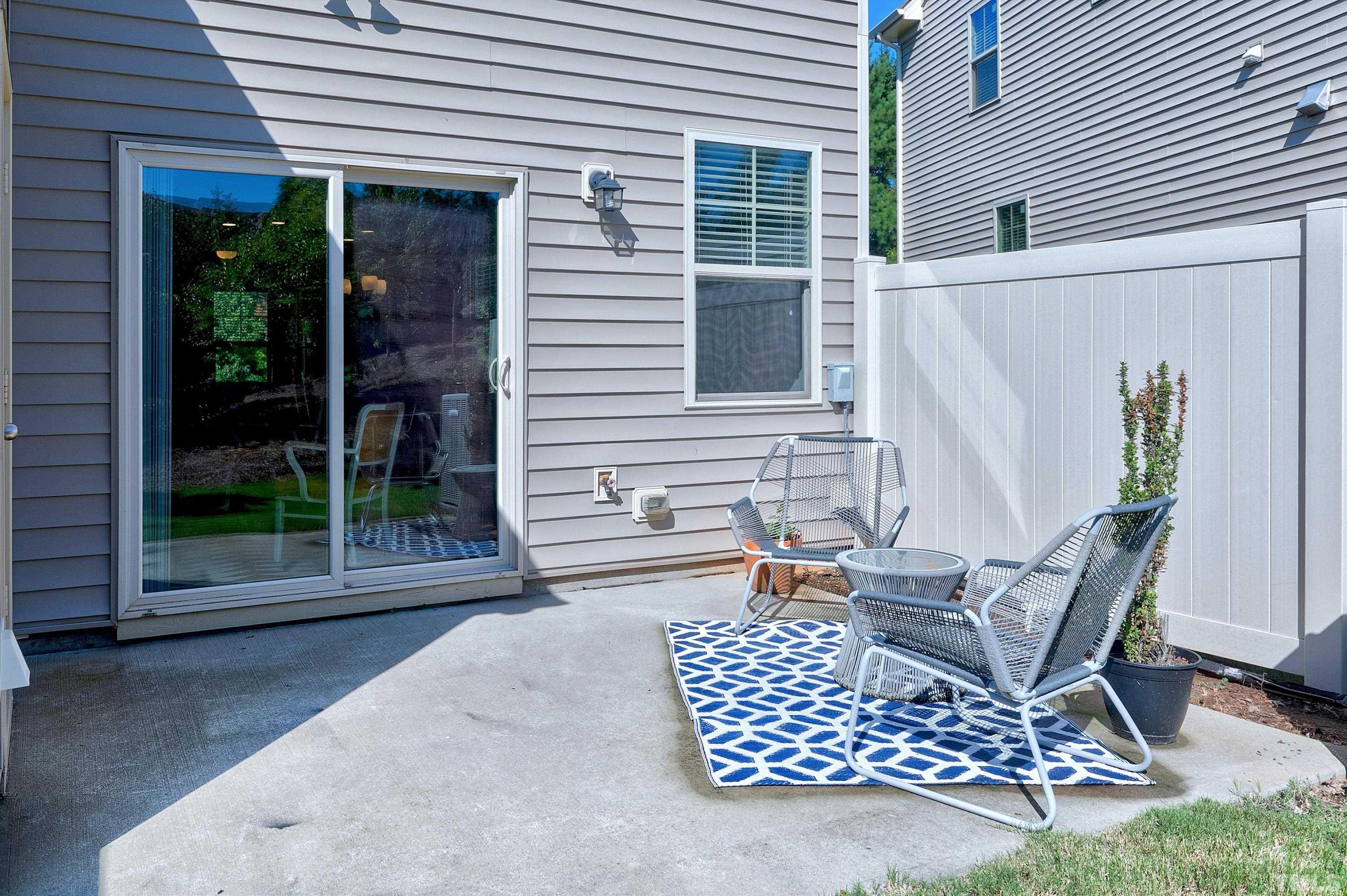 7906 Allscott Way Raleigh, NC 27612 - Photo 26 of 30 a view of porch with furniture