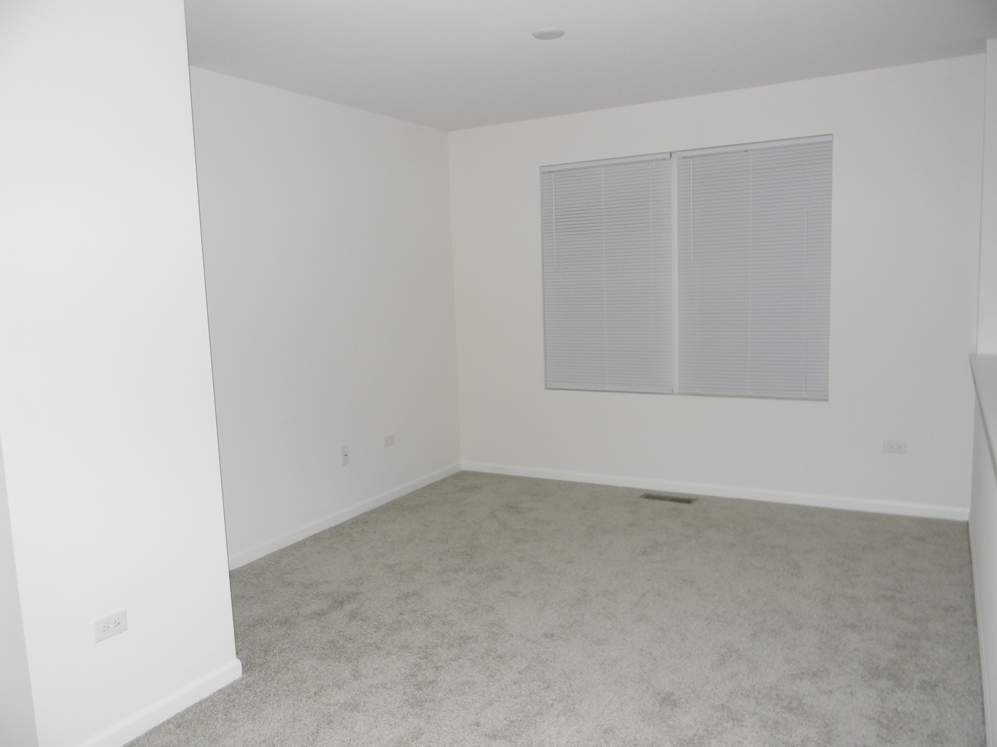 6616 Eich Drive Joliet, IL 60431 - Photo 18 of 20 an empty room with a workbench