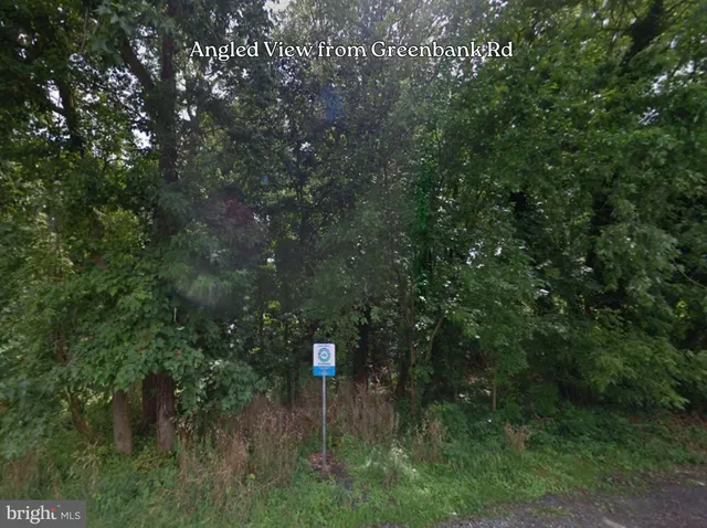 a utility room with toys and wooden floor