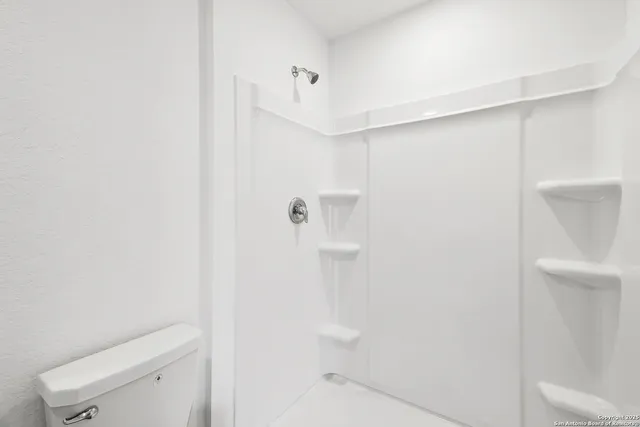 a view of small space with racks on the wall