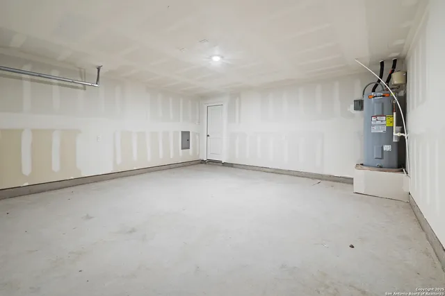 an aerial view of residential houses with city view