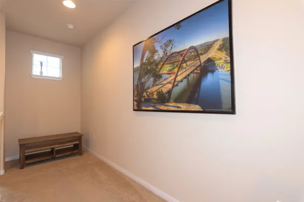 a view of a house with backyard and a garden