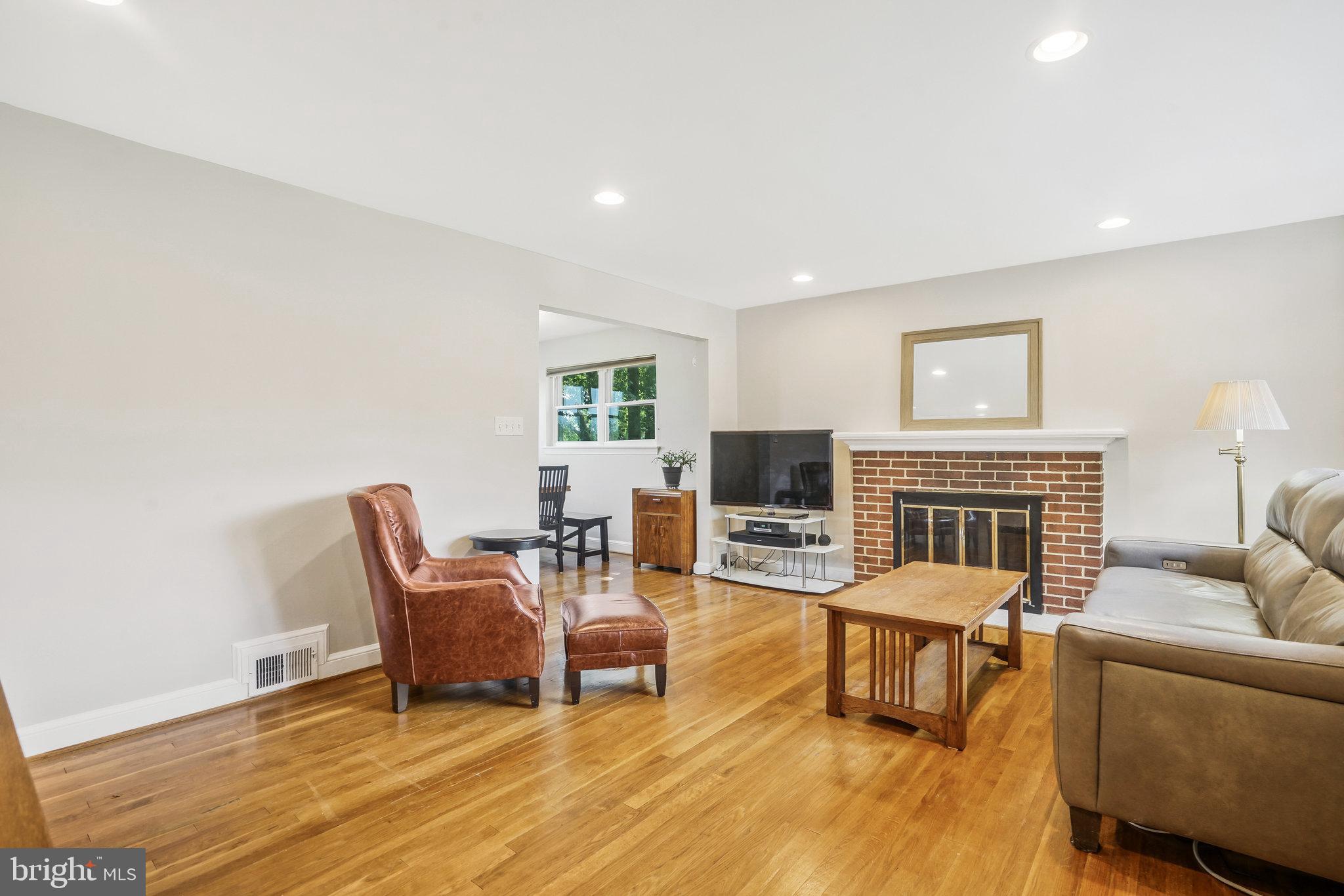 5909 Craig Street Springfield, VA 22150 - Photo 5 of 31 LIVING ROOM W/ FIREPLACE