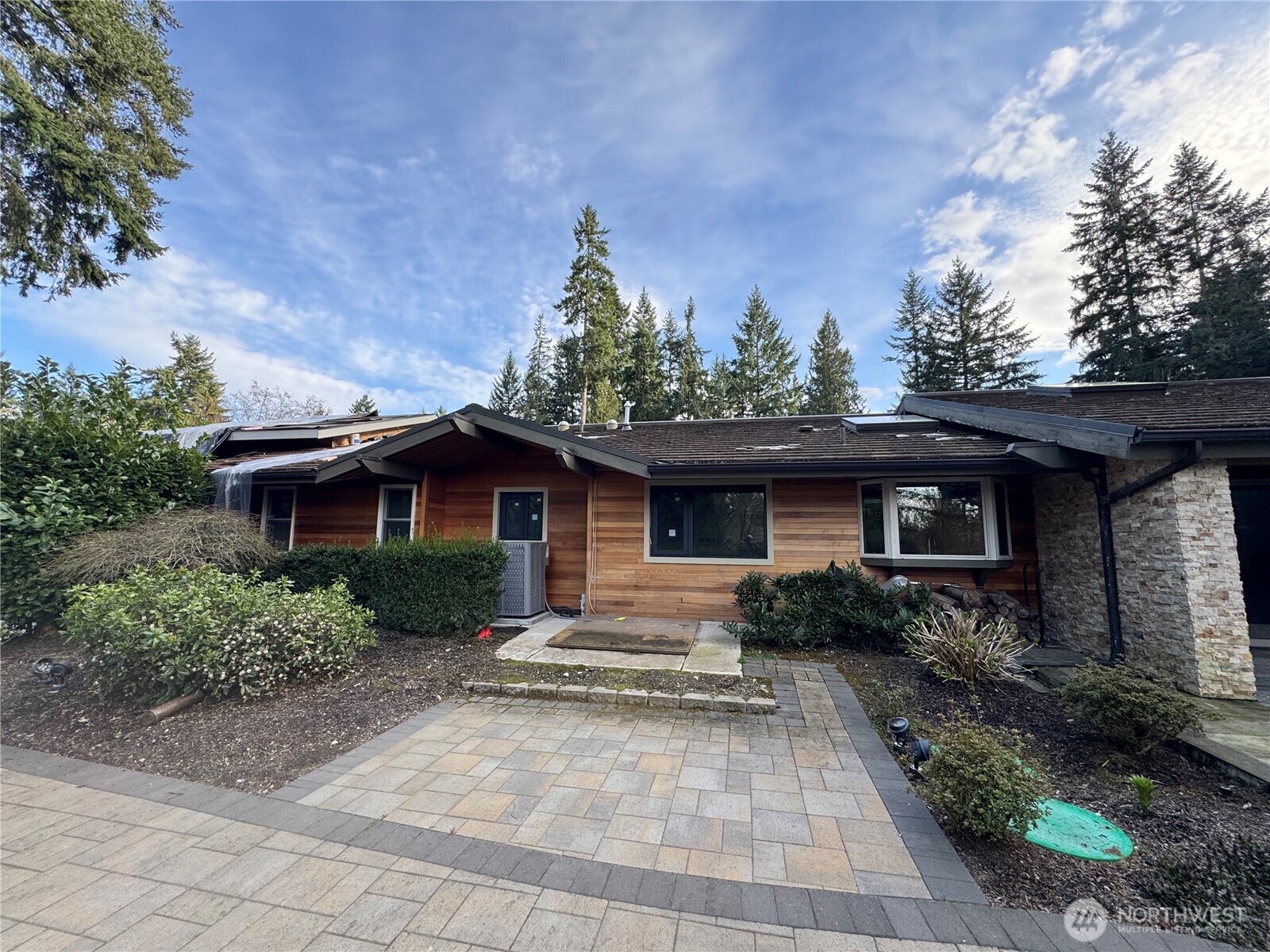 2620 Maltby Road Bothell, WA 98012 - Photo 10 of 39 a house with trees in the background