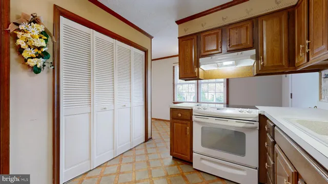 a view of a hallway with a chandelier