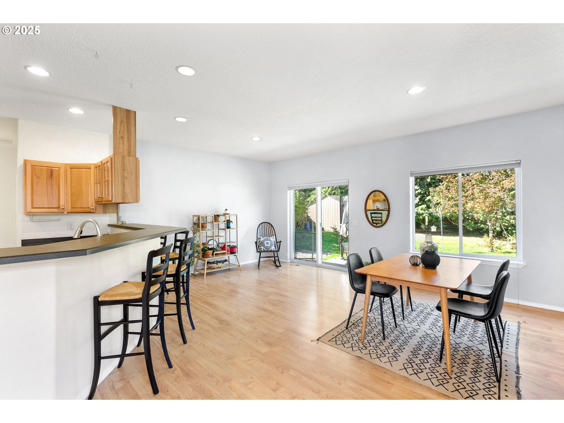 780 Henderson Road Hood River, OR 97031 - Photo 11 of 35 a dining room with a wooden table and chairs