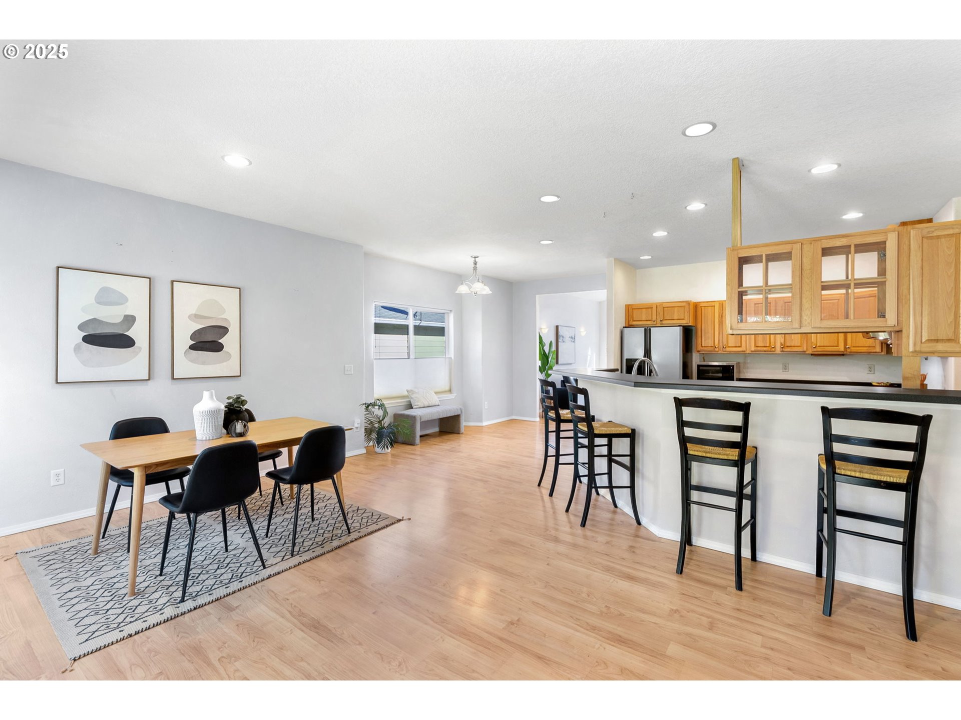 780 Henderson Road Hood River, OR 97031 - Photo 12 of 35 a living room with stainless steel appliances kitchen island granite countertop furniture and a dining table