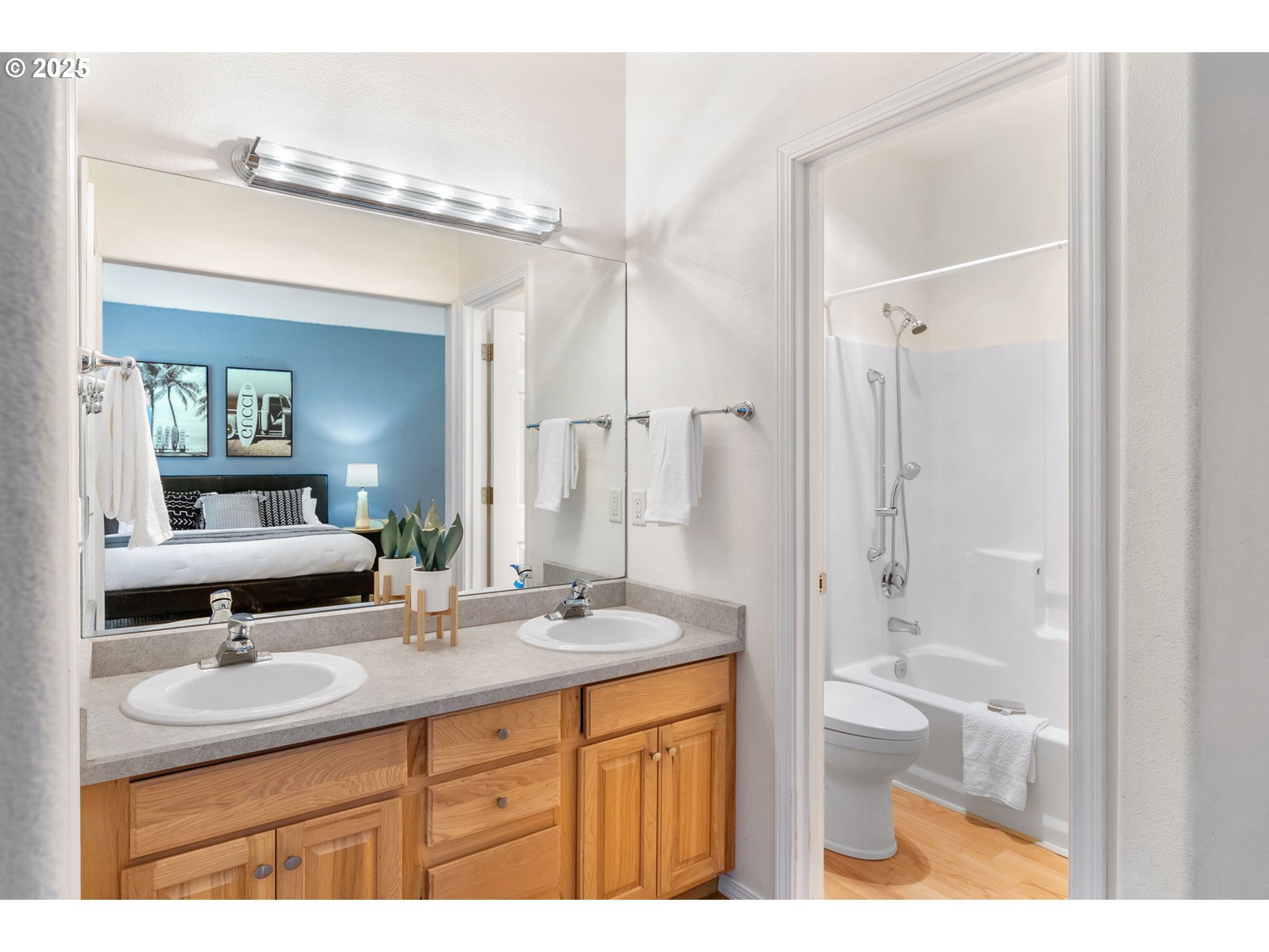 780 Henderson Road Hood River, OR 97031 - Photo 15 of 35 a bathroom with a granite countertop sink toilet a shower a mirror and a bathtub