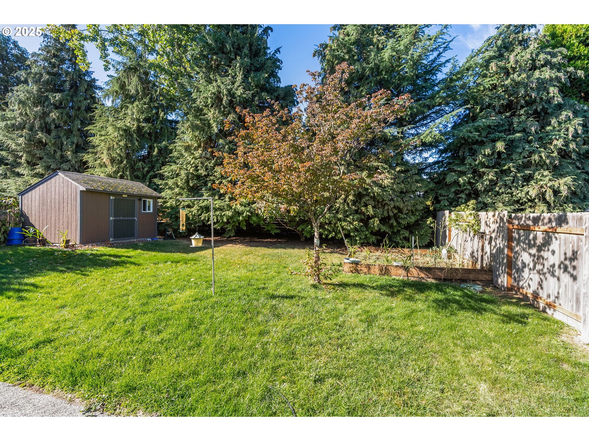 780 Henderson Road Hood River, OR 97031 - Photo 27 of 35 a backyard of a house with lots of green space