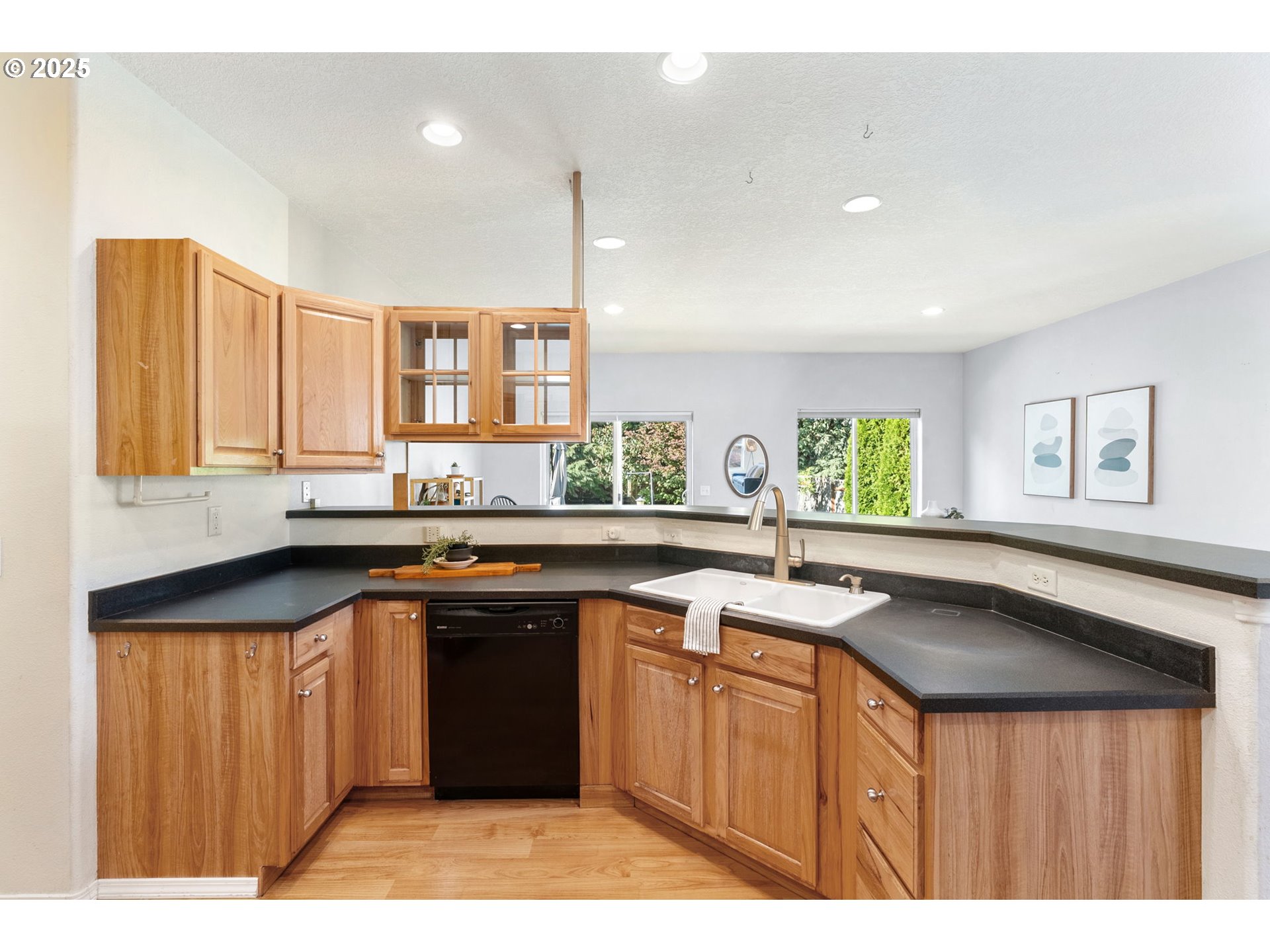 780 Henderson Road Hood River, OR 97031 - Photo 7 of 35 a kitchen with granite countertop a sink and cabinets