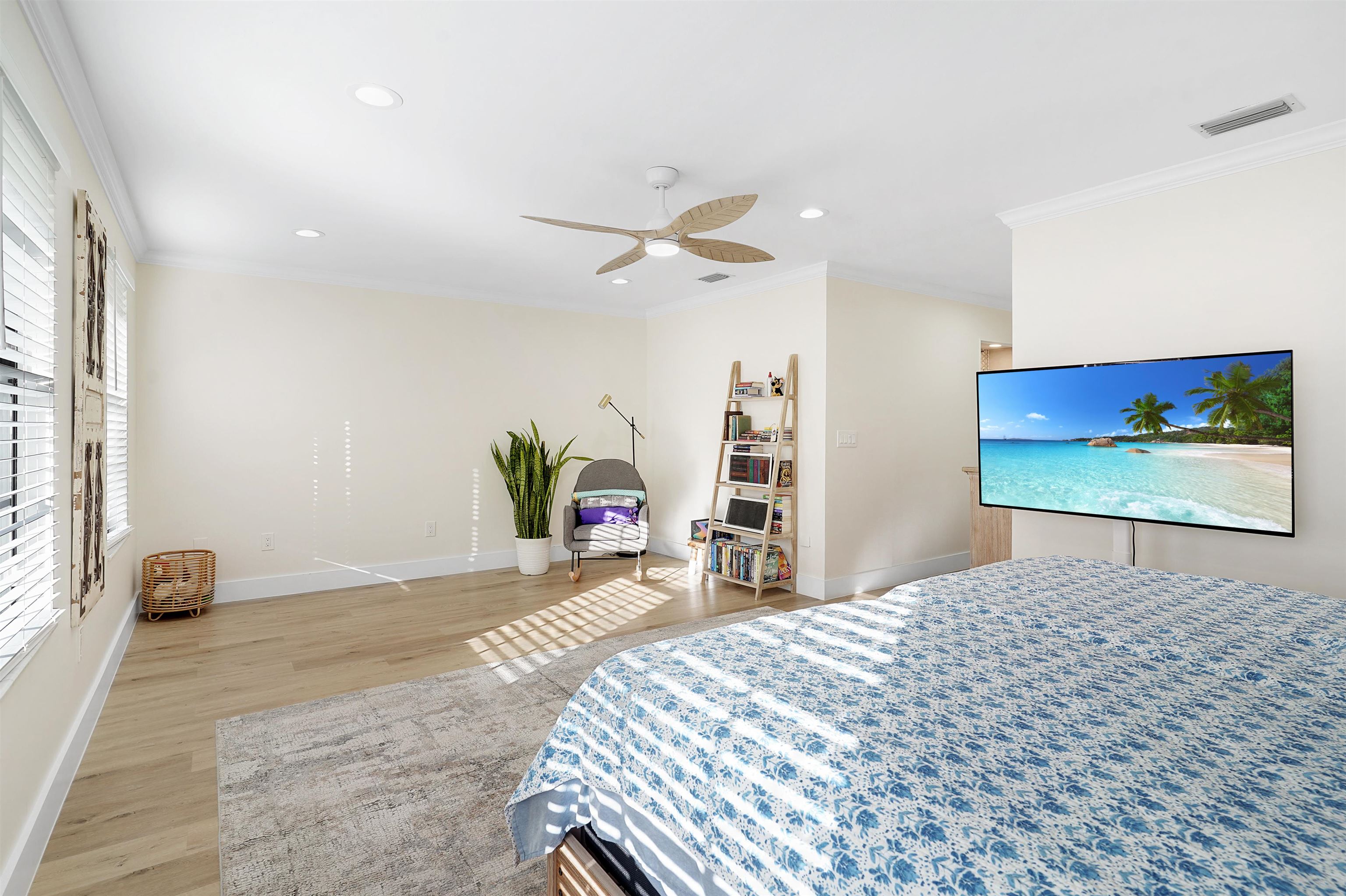 3020 Mac Road St. Augustine, FL 32086 - Photo 19 of 49 Bedroom featuring light wood-type flooring, ceiling fan, recessed lighting, and crown molding