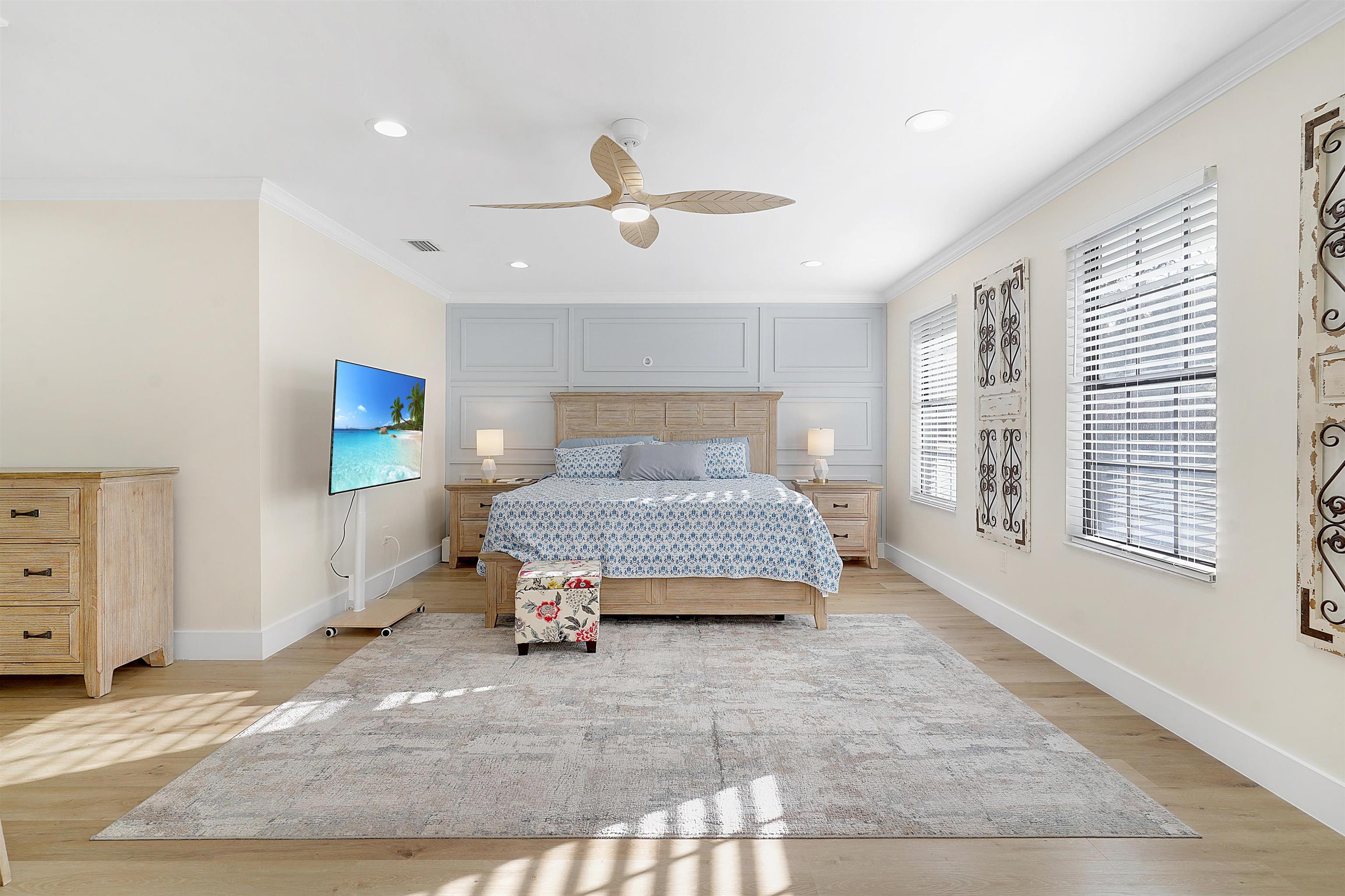 3020 Mac Road St. Augustine, FL 32086 - Photo 4 of 49 Bedroom featuring light wood finished floors, crown molding, ceiling fan, and recessed lighting